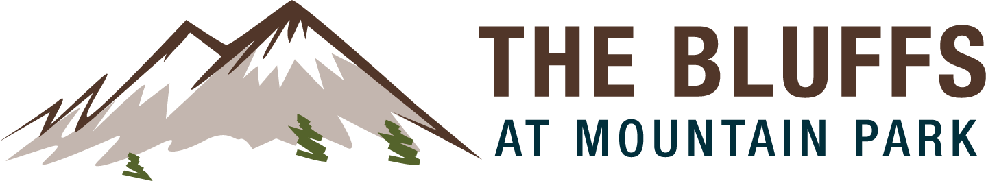 A mountain range is depicted with the text "The Bluffs at Mountain Park".
